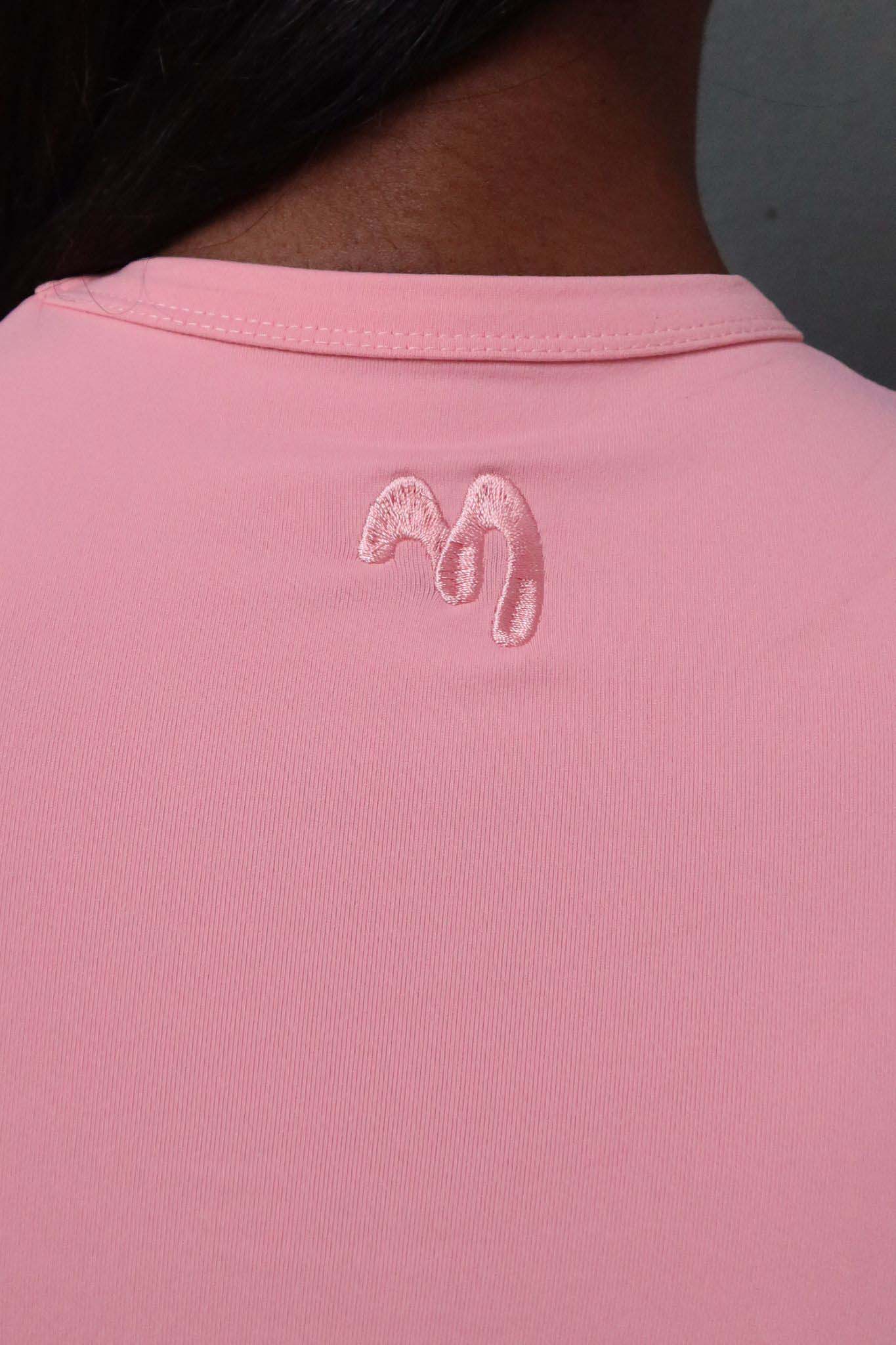 Close-up pink sports t-shirt with embroidered logo on the back.